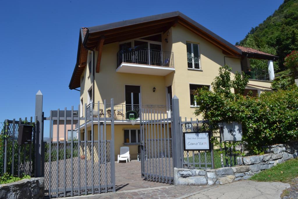Comova Maslianico Bagian luar foto
