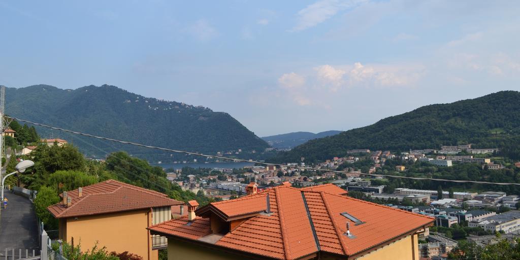 Comova Maslianico Bagian luar foto